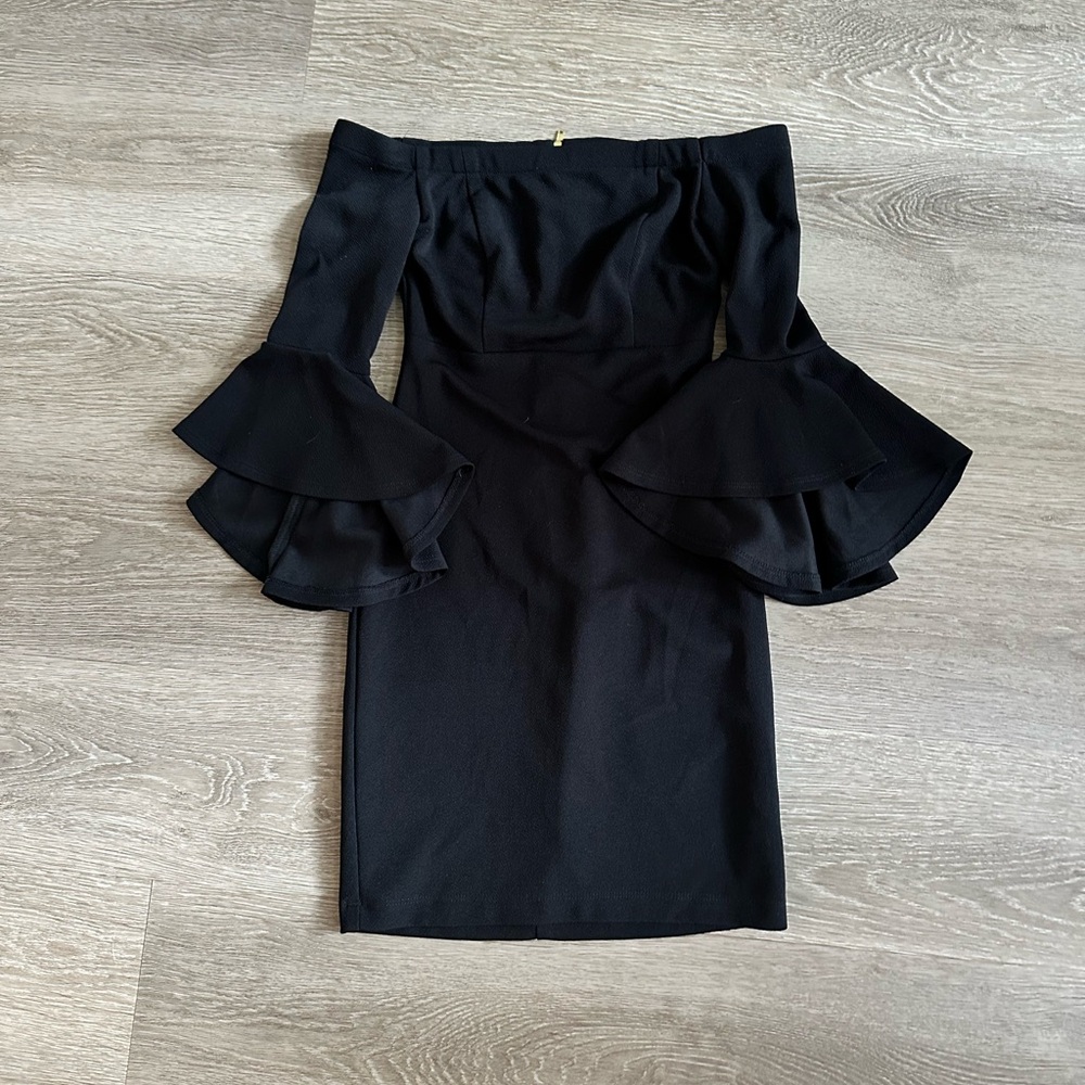 Black off the shoulder mini pencil dress with ruffle sleeves size 3.